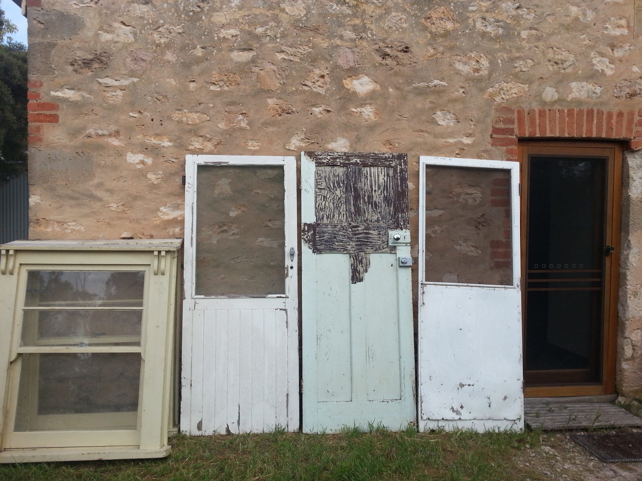 Garage Sales are a great place to find old doors and windows for upcycling
