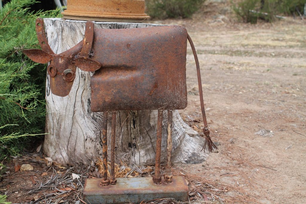 upcycled rusty cow made from recycled metal