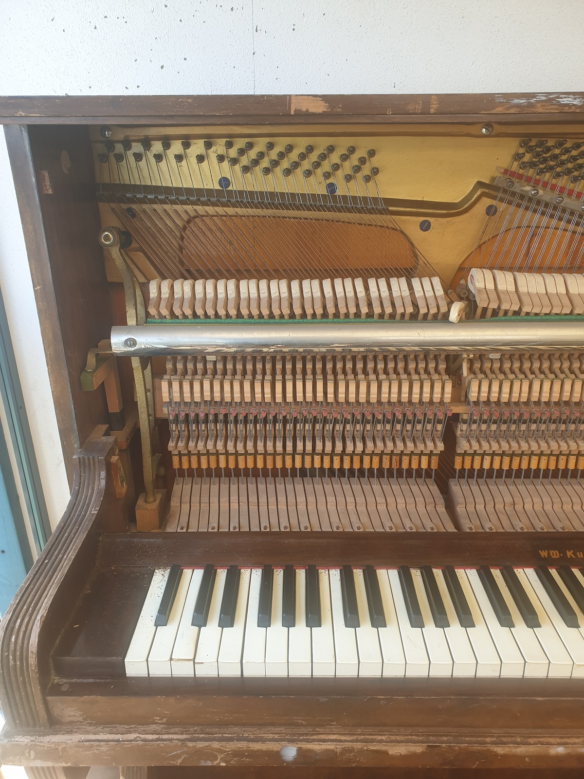 how to upcycle and repurpose and old upright piano into a cabinet